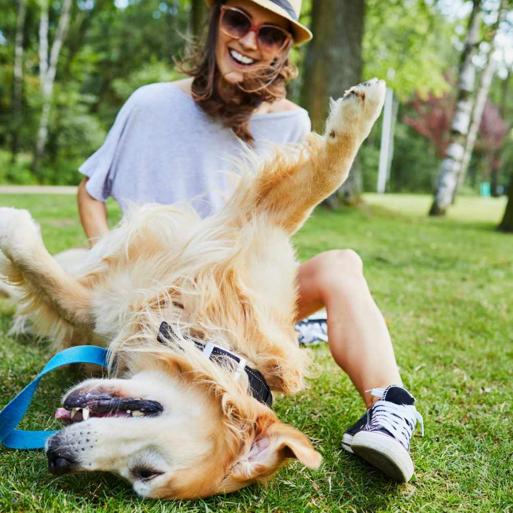 resident with her dog outside at Commonwealth Apartments in Midlothian, Virginia