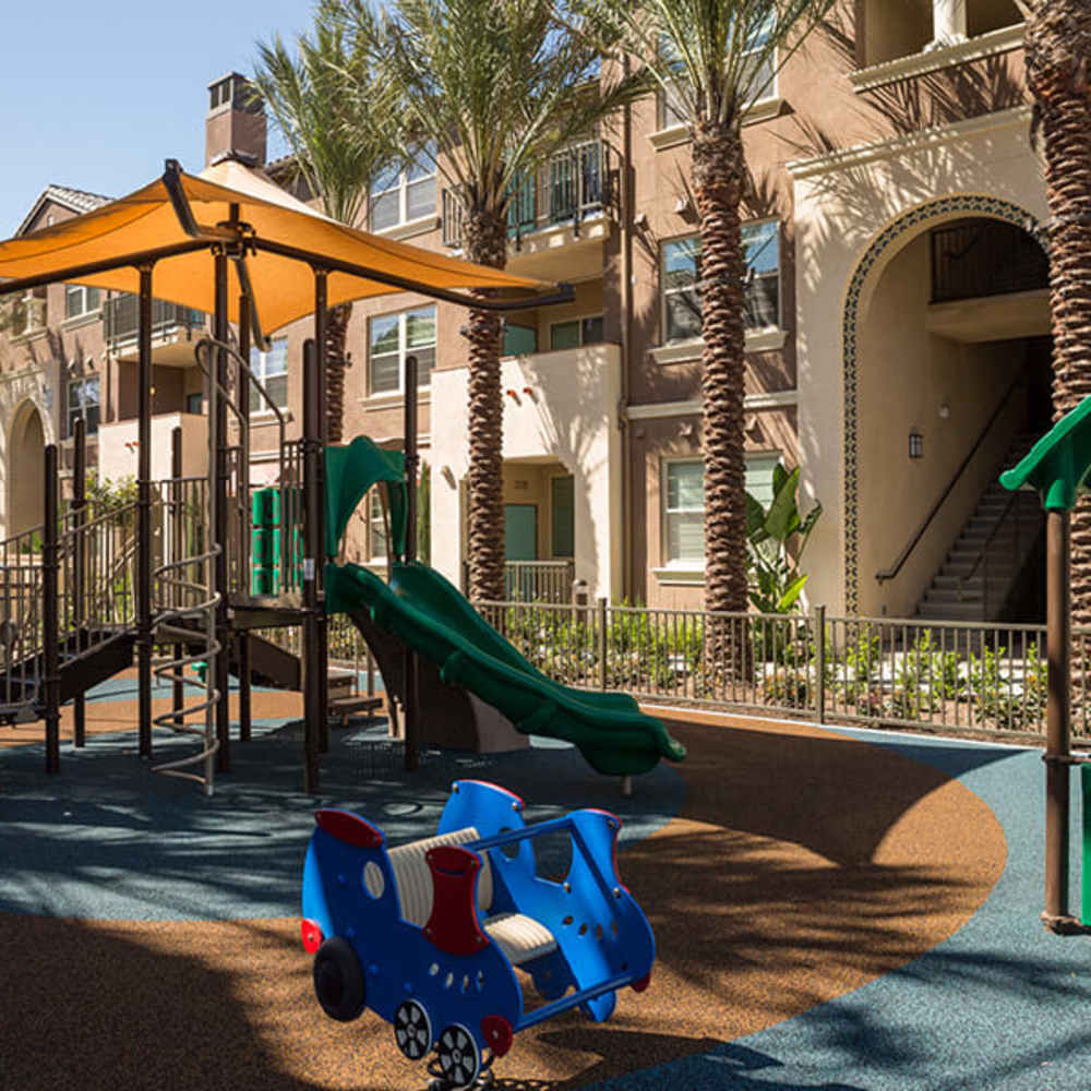 Residents laying in the park near Solimar Luxury Homes in Wilmington, California