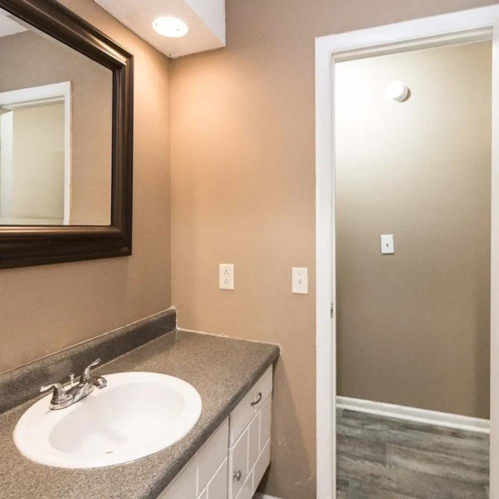Washroom with vanity mirror at Willow Creek Apartments in Chattanooga, Tennessee 