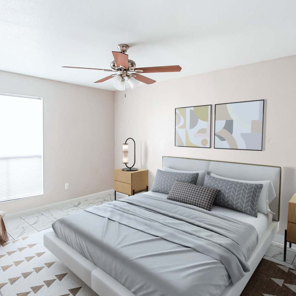 Bedroom with a ceiling fan at The Sanctuary At 9430 in Houston, Texas