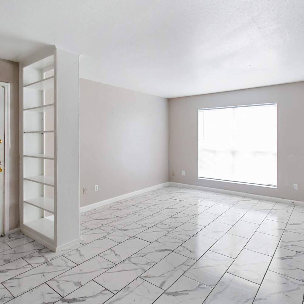 Open living space with built in shelving at The Sanctuary At 9430 in Houston, Texas
