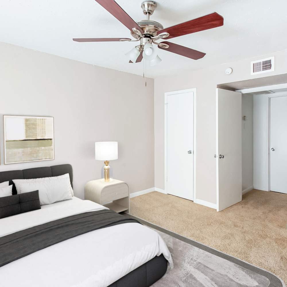 Bedroom with plush carpeting at The Sanctuary At 9430 in Houston, Texas