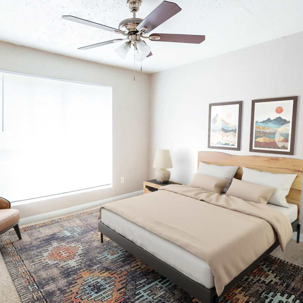 Bedroom with large windows at The Sanctuary At 9430 in Houston, Texas