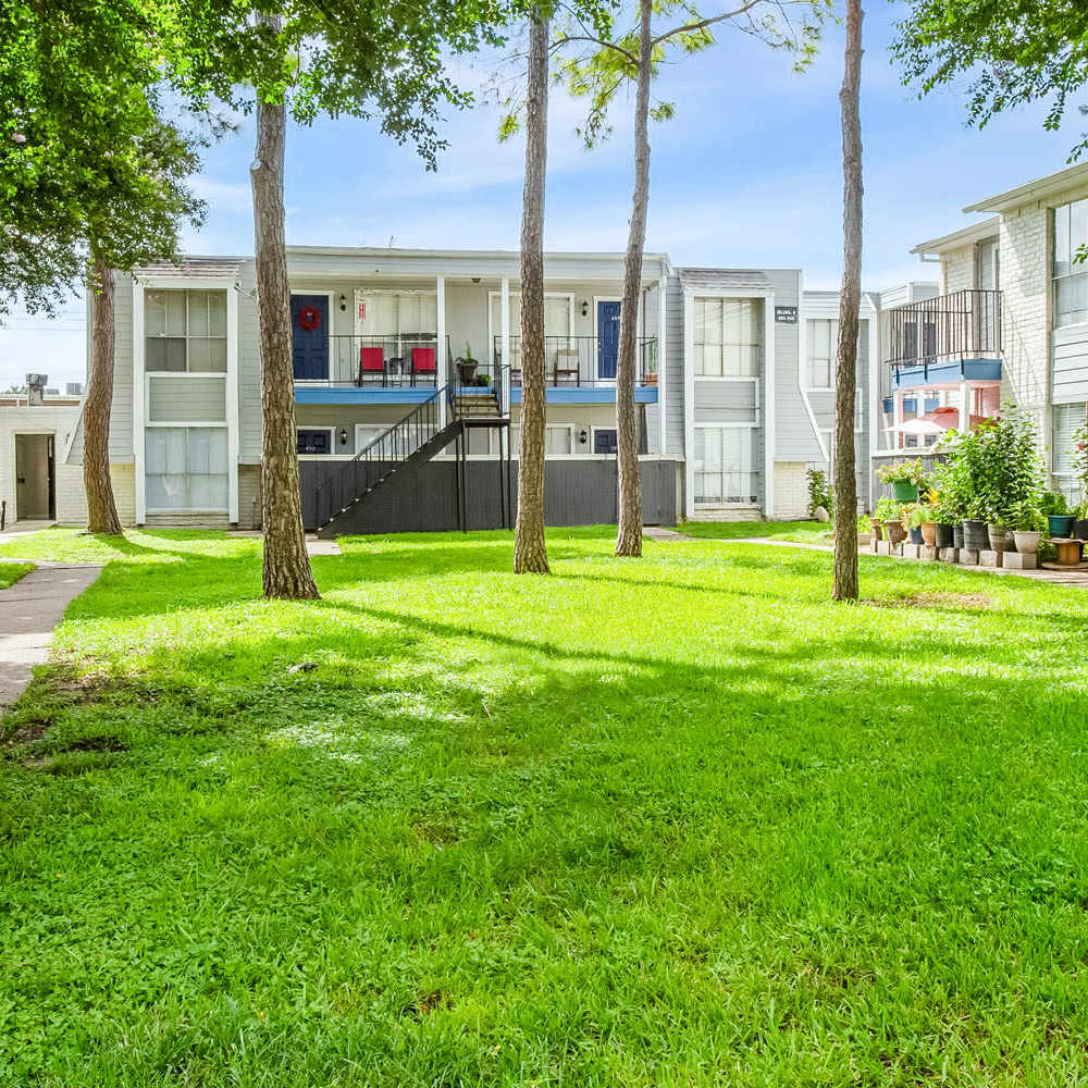Green spaces and trees at The Sanctuary At 9430 in Houston, Texas