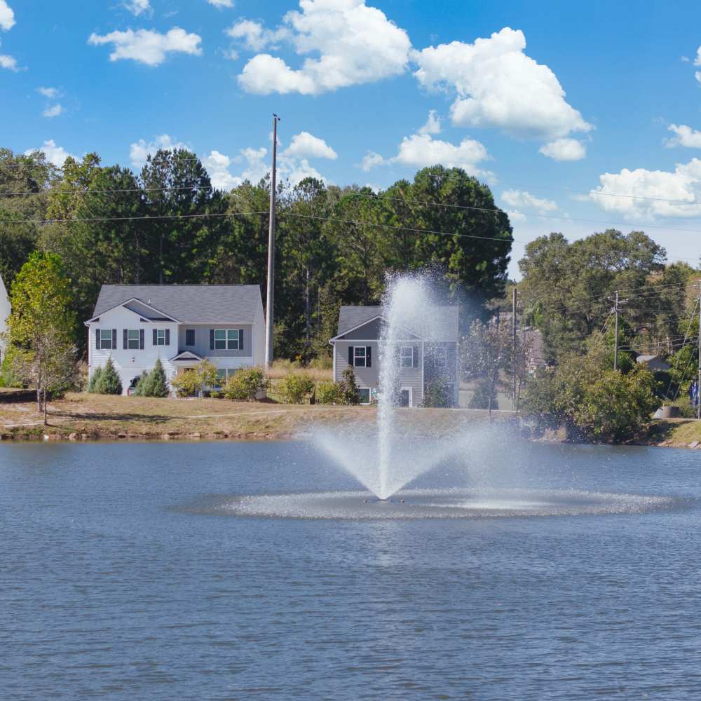 Pond with a fountain at The Lakes at Statham in Statham, Georgia