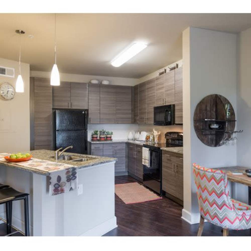 Kitchen with storage cabinetries at Beacon 430 in Saint Petersburg, Florida