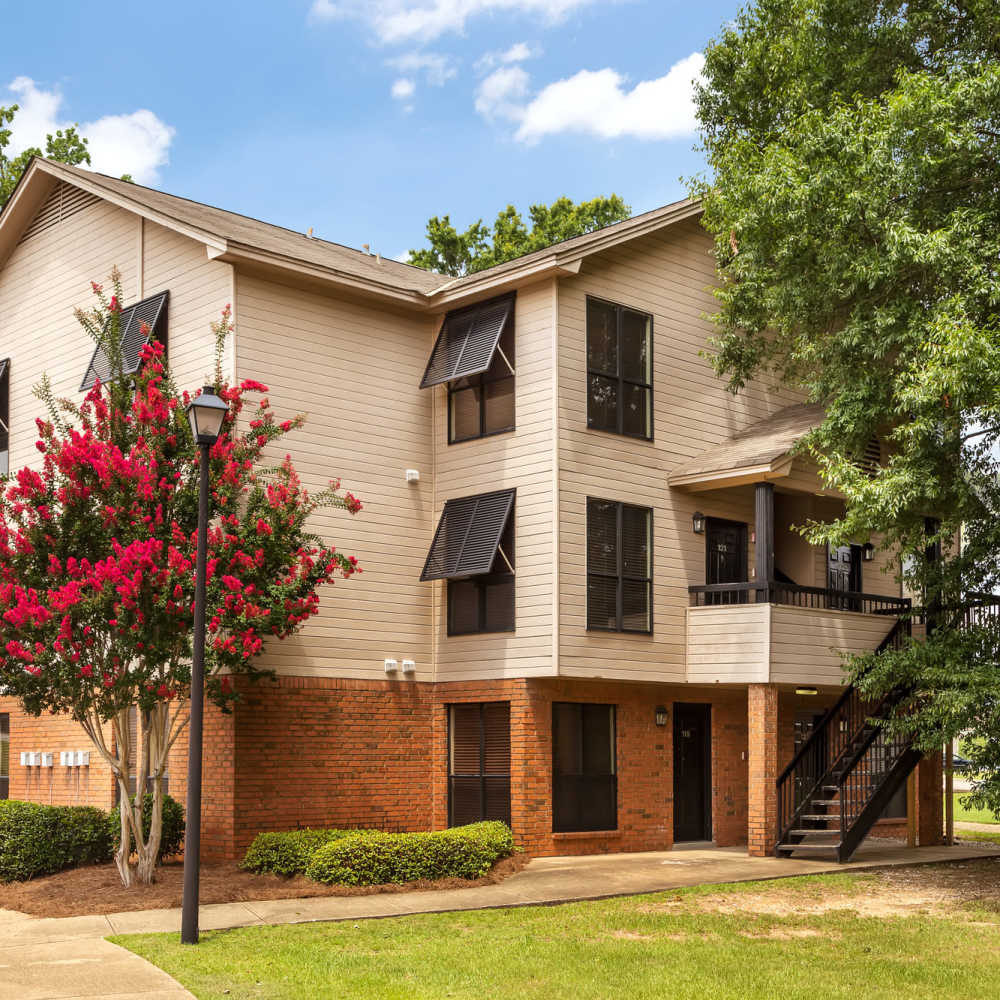 Exterior view of the apartment building at The Arbors On Taylor in Montgomery, Alabama