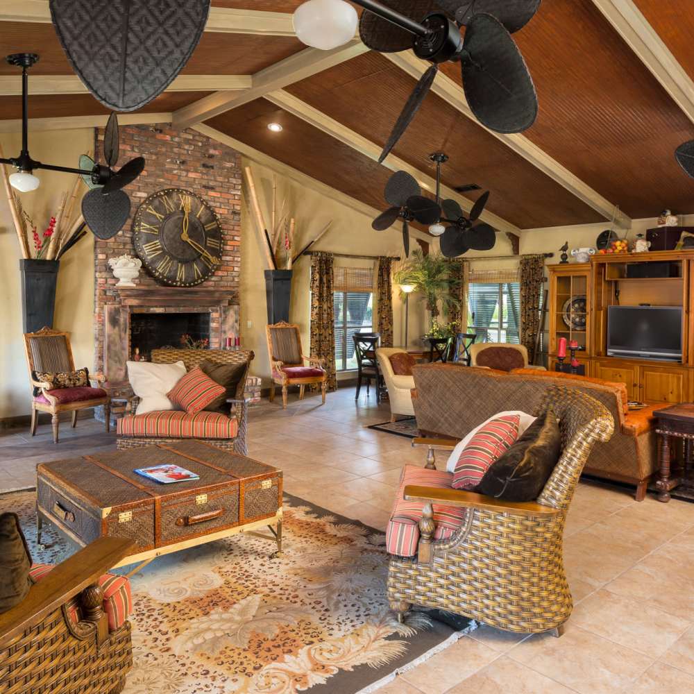 Spacious clubhouse with multiple seating and firepit at The Arbors On Taylor in Montgomery, Alabama