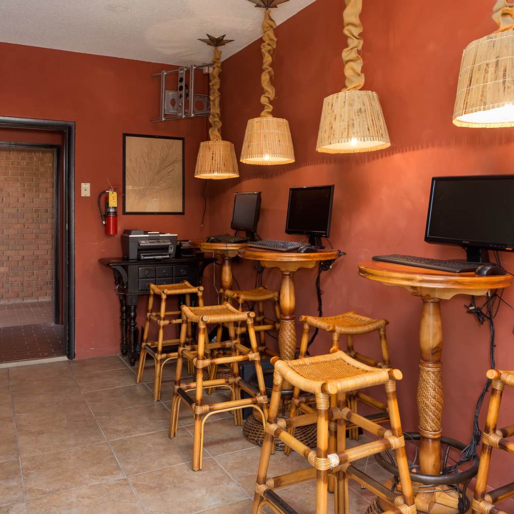 Internet cafe with multiplte desktops, stool and high-speed internet at The Arbors On Taylor in Montgomery, Alabama