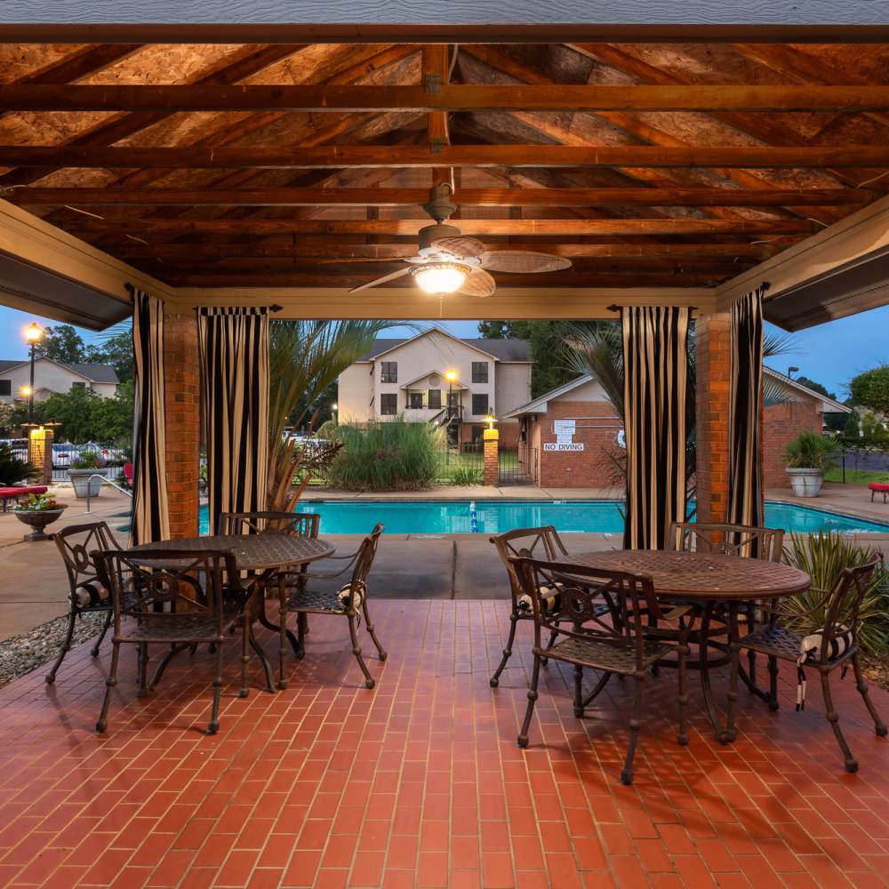 Swimming pool with cabana at The Arbors On Taylor in Montgomery, Alabama