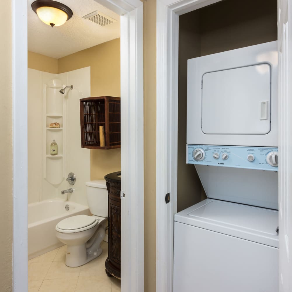 Bathroom with a toilet, bathtub, and a shower at The Arbors On Taylor in Montgomery, Alabama