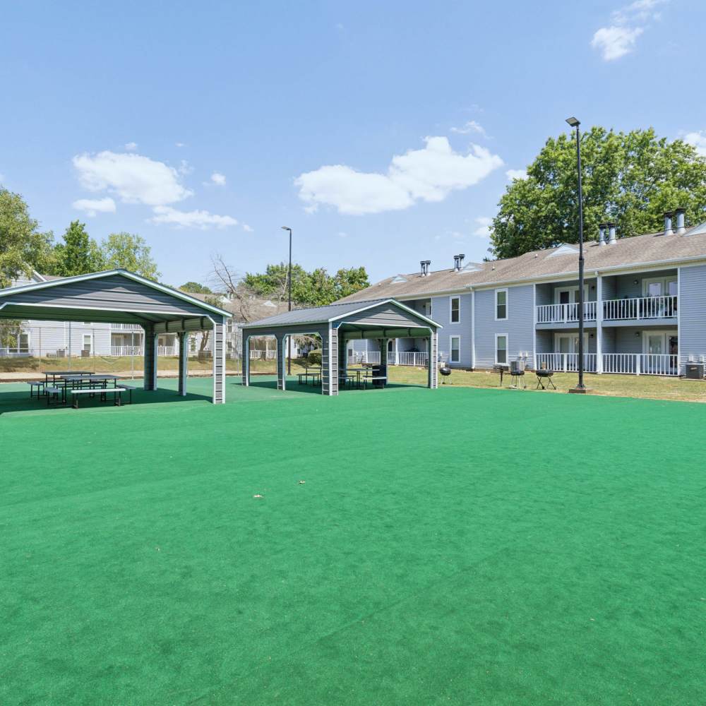 View of apartment with walking path, trees at Piccadilly Apartments in Goodlettsville, Tennessee