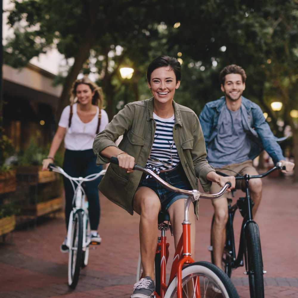 Students riding bikes at The Quarters Gainesville in Gainesville, Florida
