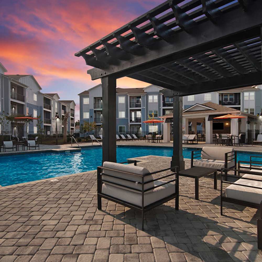 Swimming pool with sunlounges at Artisan Carolina Forest in Myrtle Beach, South Carolina