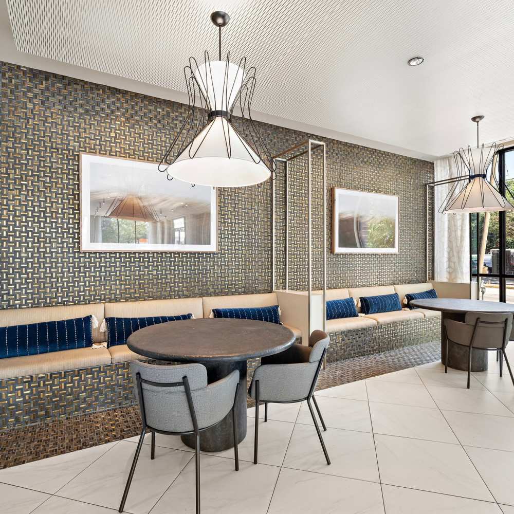 Resident lounge with cafe area at 3800 Main in Houston, Texas
