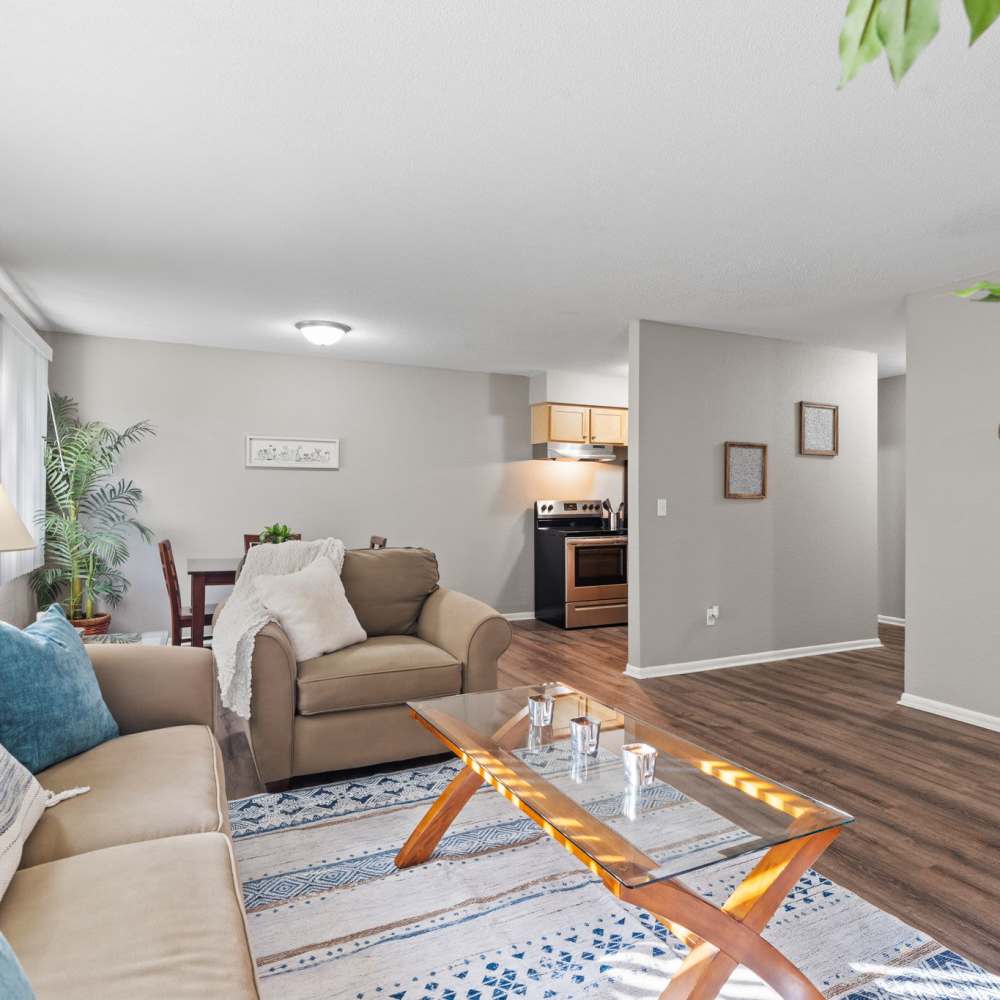 Living room with beige color sofa set at Granite Ridge in Brooklyn Park, Minnesota