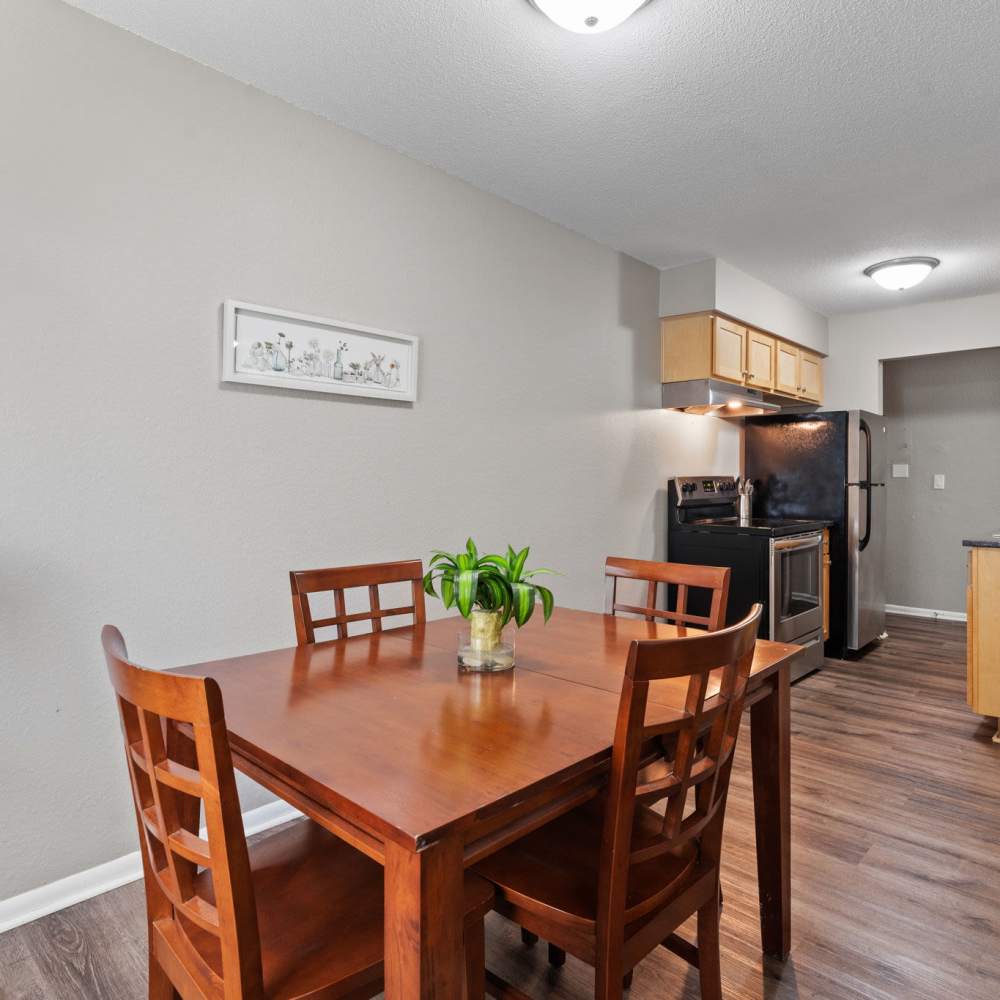 Dining area with view to kitchen at Granite Ridge in Brooklyn Park, Minnesota