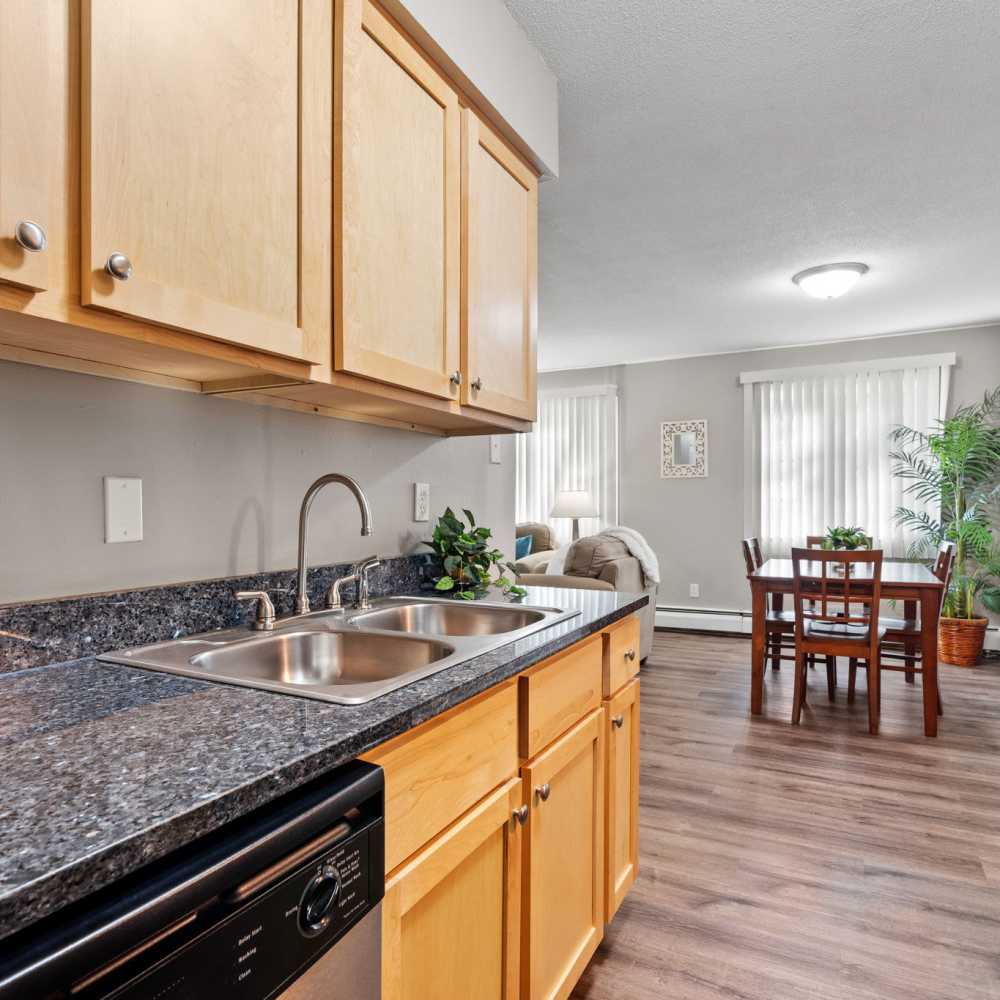 Kitchen with granite countertop at Granite Ridge in Brooklyn Park, Minnesota