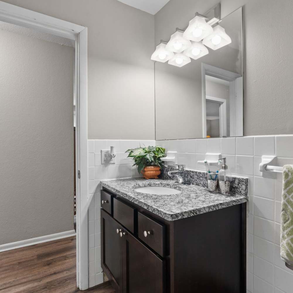 Bathroom with vanity mirror and lights at Granite Ridge in Brooklyn Park, Minnesota