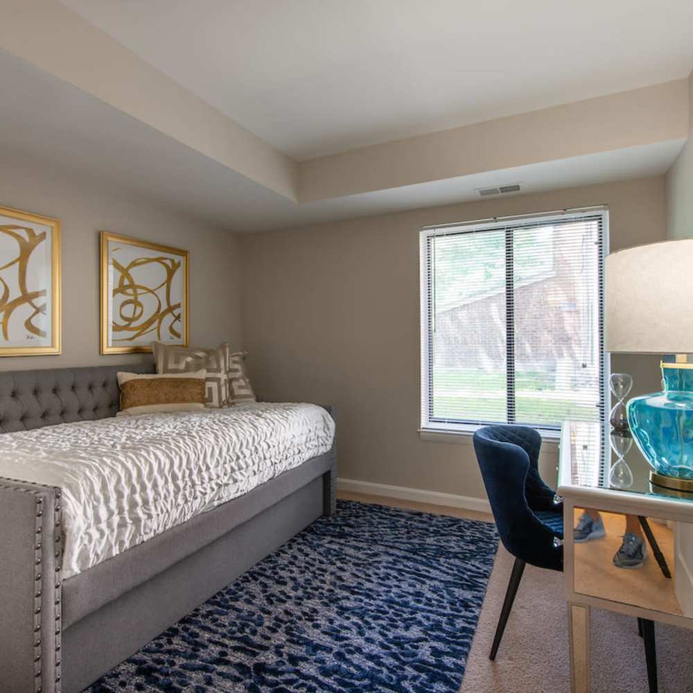 Living room with study table at The Elms at Old Mill in Millersville, Maryland
