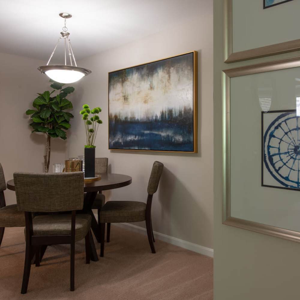 Dining table with hanging light at The Elms at Old Mill in Millersville, Maryland 