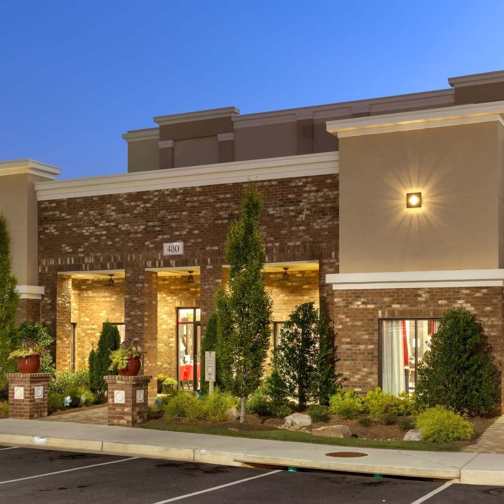 Night view of the community parking area at Terraces at Suwanee Gateway in Suwanee,Georgia