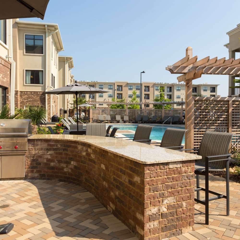 Community BBQ area at Terraces at Suwanee Gateway in Suwanee,Georgia