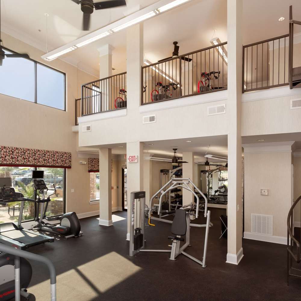 Spacious multistoried fitness center for the community at Terraces at Suwanee Gateway in Suwanee,Georgia