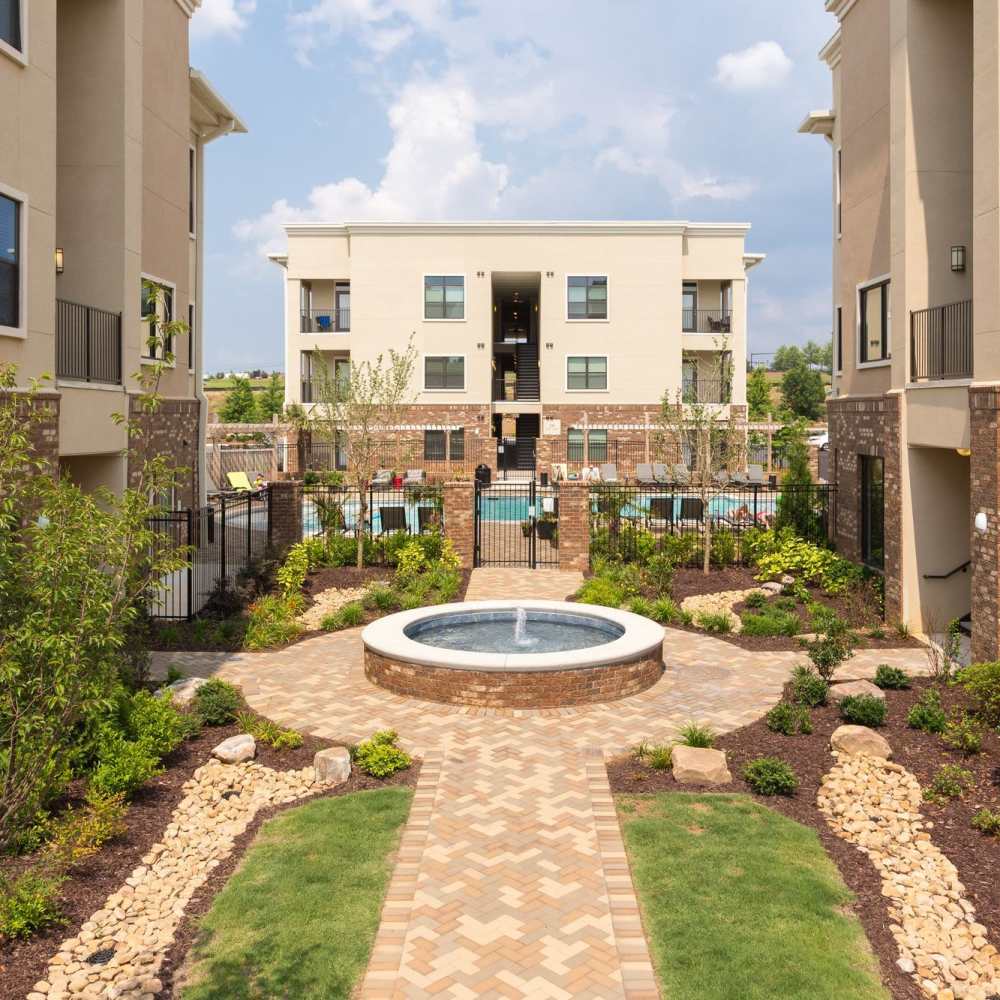Water fountain and beautiful lawn layout at Terraces at Suwanee Gateway in Suwanee,Georgia