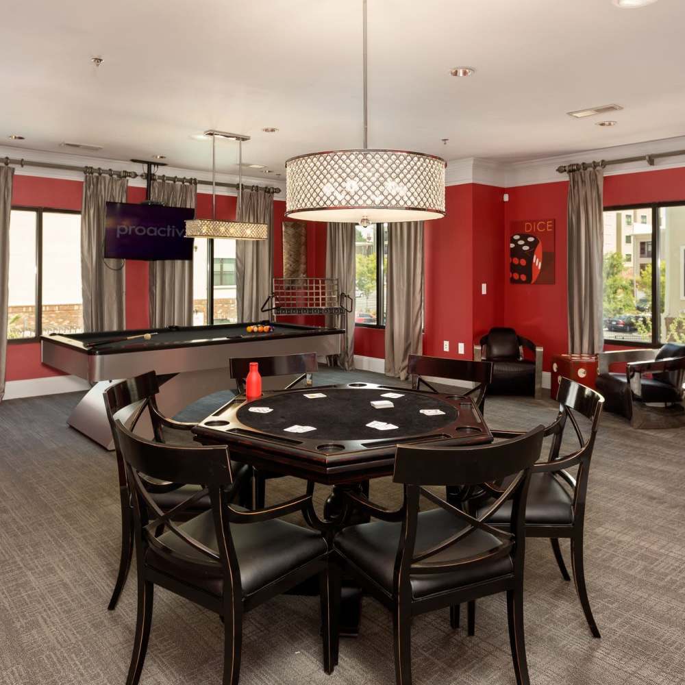 Poker table in the recreation center at Terraces at Suwanee Gateway in Suwanee,Georgia