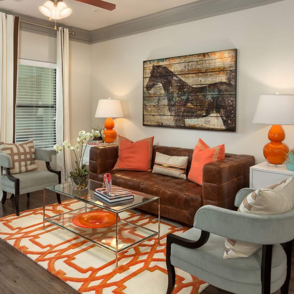 Beautiful living room with bright interiors at Terraces at Suwanee Gateway in Suwanee,Georgia