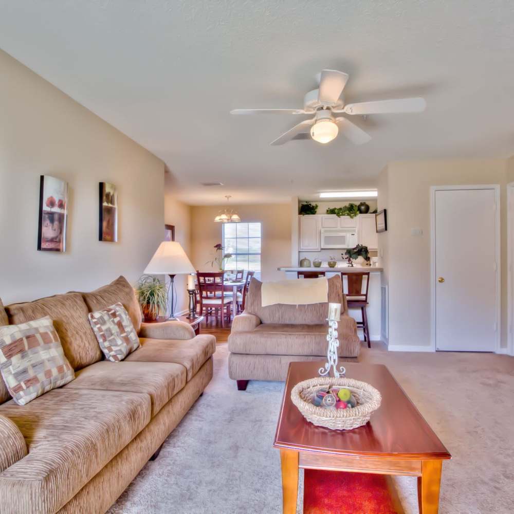 Bright living room with lot of space for couch and coffee-table at Arbors at the Reservoir in Ridgeland, Mississippi, 