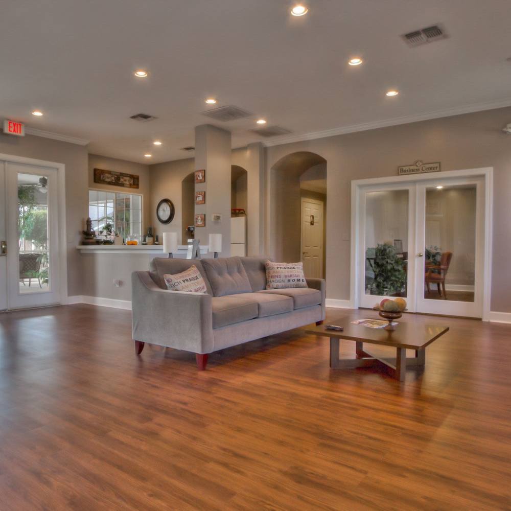 Clubhouse with wood-style flooring at Arbors at the Reservoir in Ridgeland, Mississippi, 