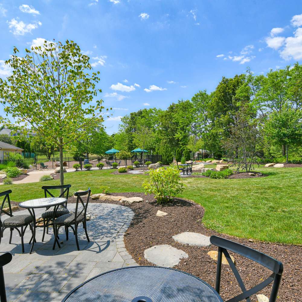 Outdoor seating area with trees all around at Hawthorne Estates, Oakdale, Pennsylvania