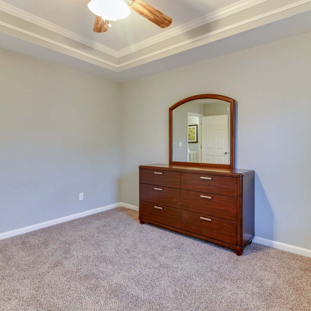 Bedroom with dresser at Davenport Condominiums in Nashville, Tennessee