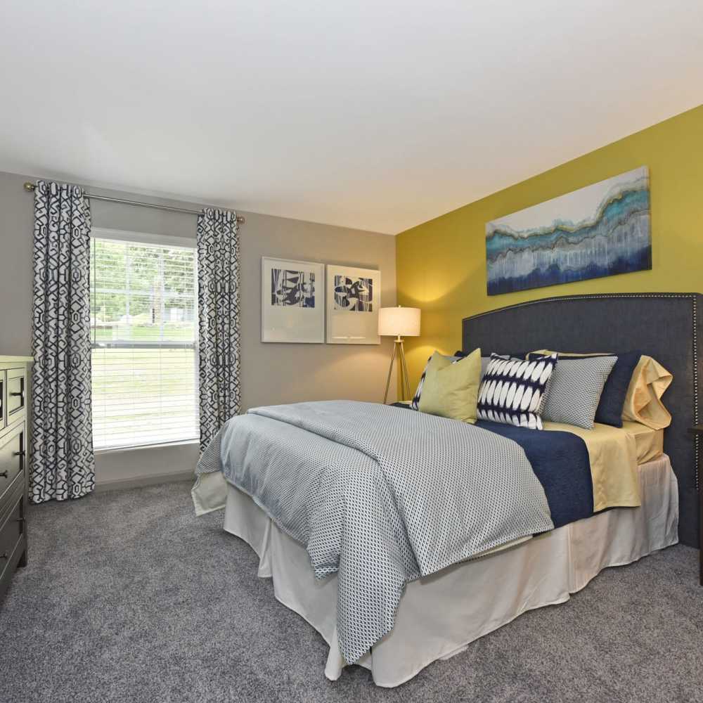 Inviting bedroom with a large window at Sona at Harding in Nashville, Tennessee
