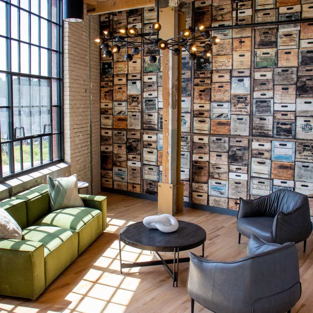 Clubhouse with couch and center table at Box Board Lofts in Grand Rapids, Michigan