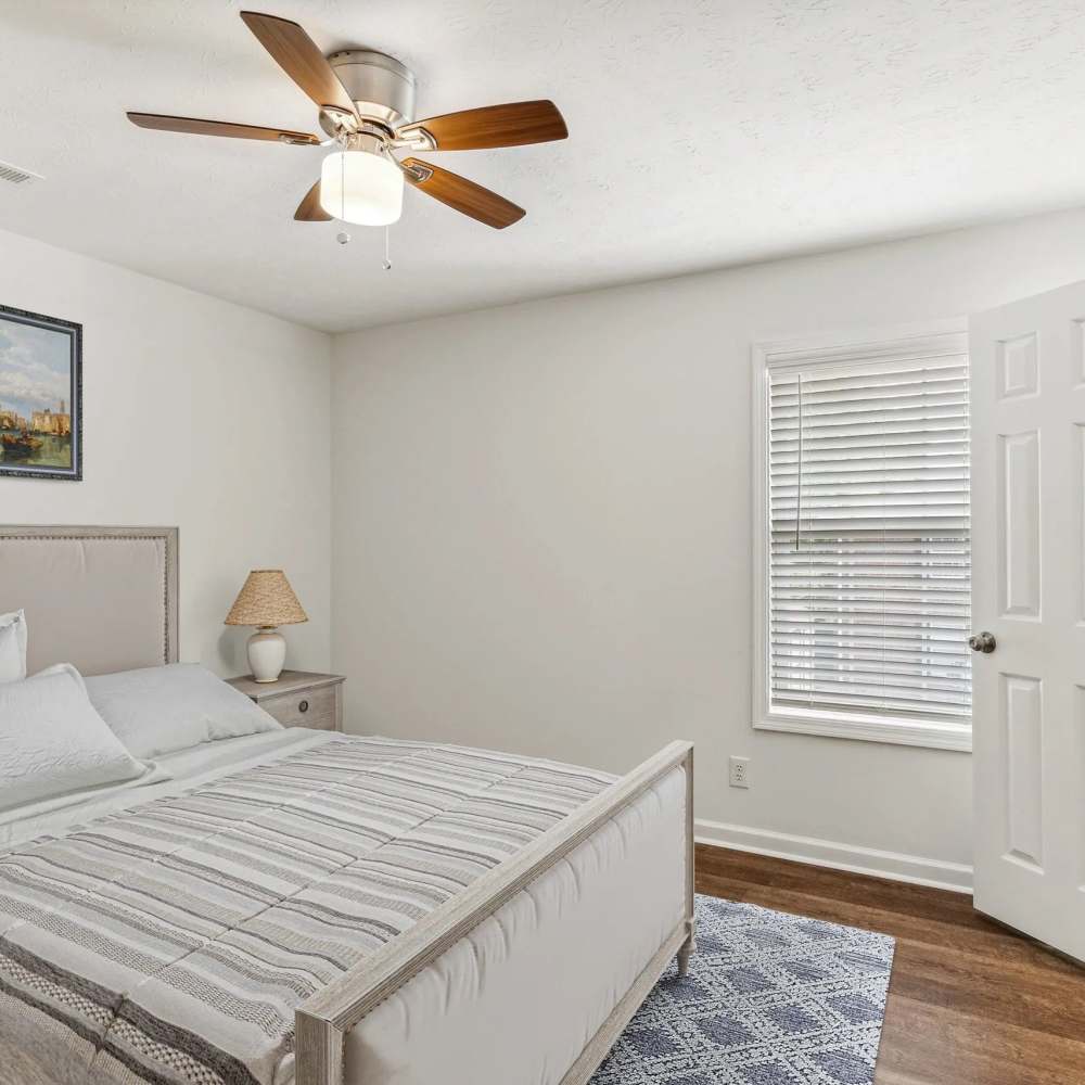 Bedroom with a ceiling fan at The Bellevue At 1045 in Cookeville, Tennessee