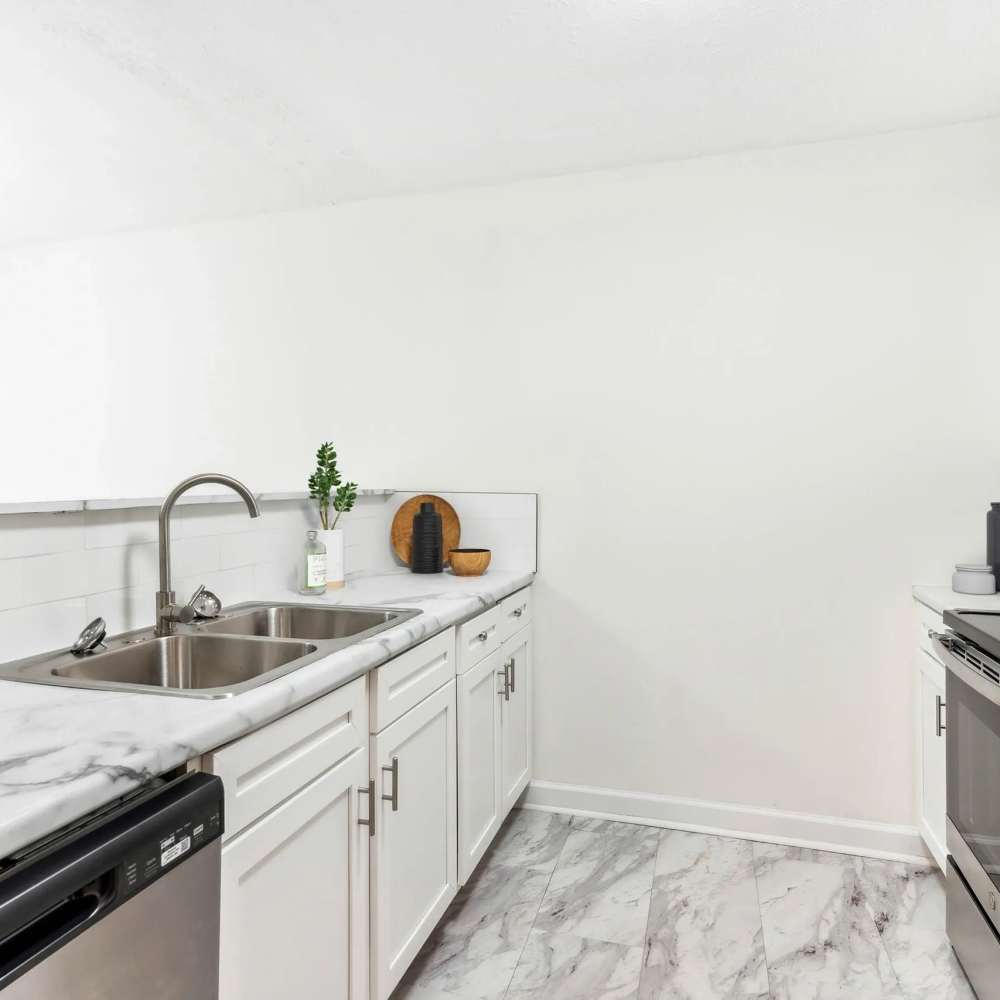 Kitchen with stainless-steel appliances at The Bellevue At 1045 in Cookeville, Tennessee