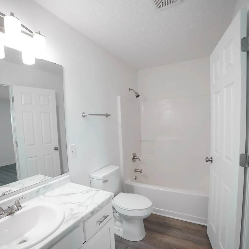 Modern finishes in an apartment bedroom at The Bellevue At 1045 in Cookeville, Tennessee