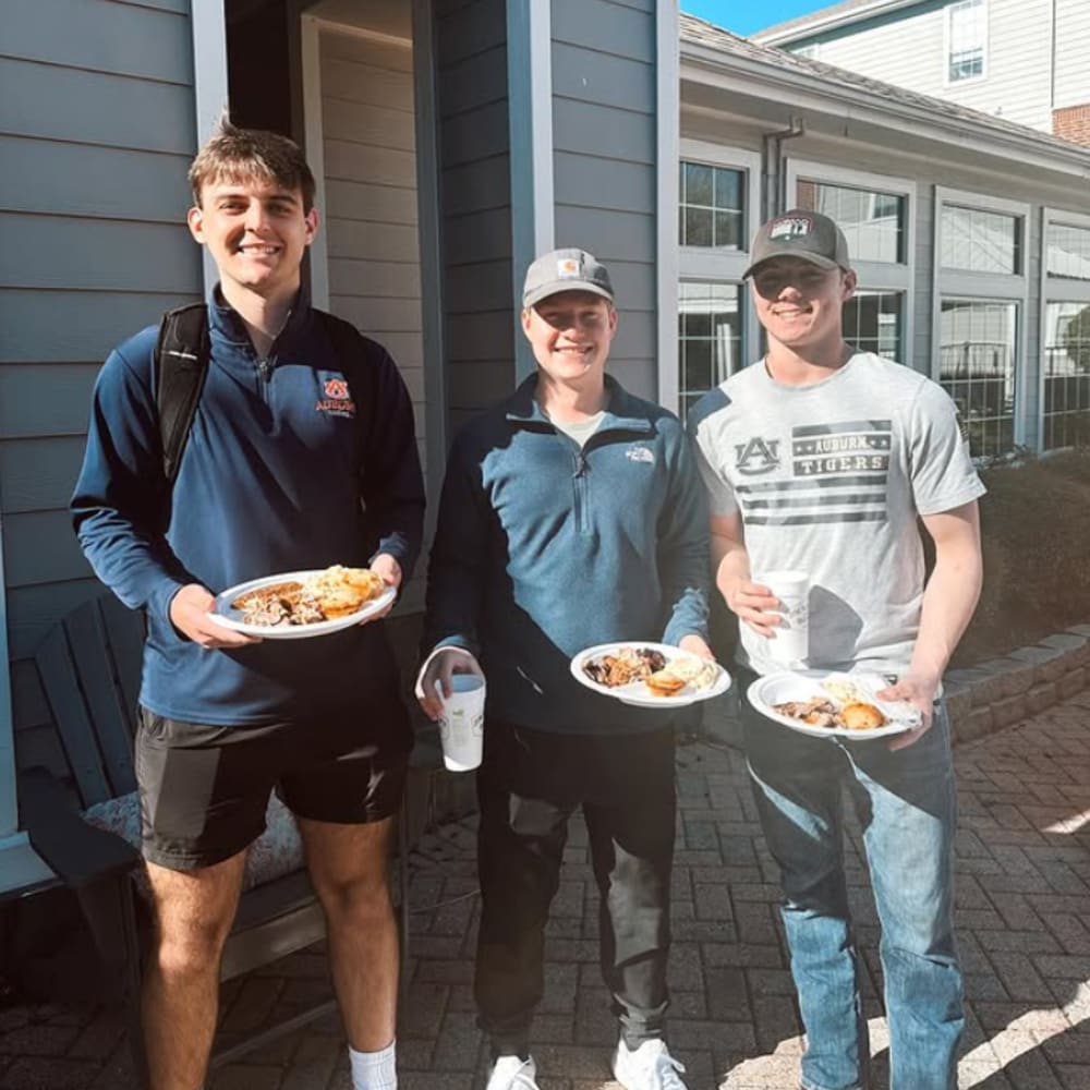 Residents at BBQ at The Beacon Auburn in Auburn, Alabama