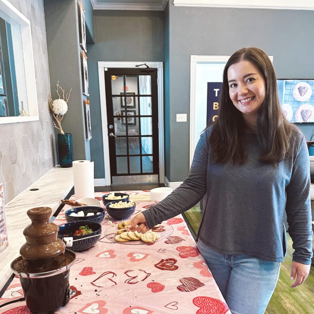 Resident eating treats at The Beacon Auburn in Auburn, Alabama