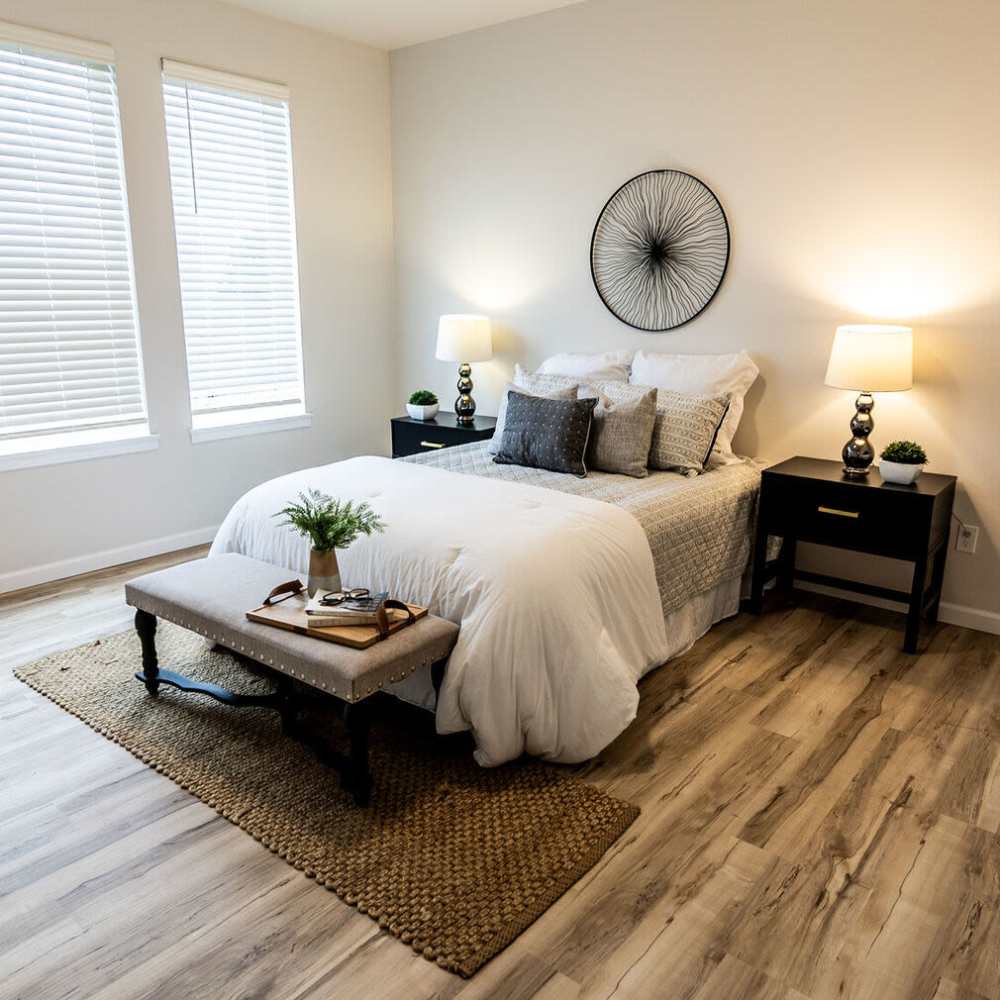 Spacious bedroom with large comfortable bed with large windows at 4315 S. Alder in Tacoma, Washington