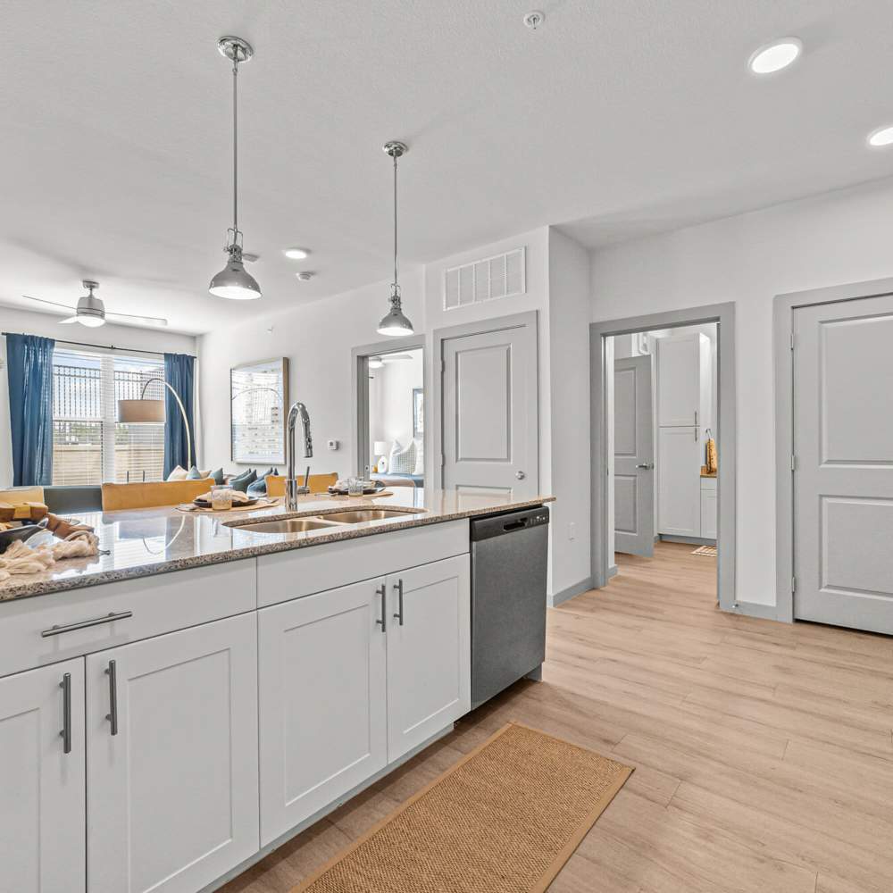 Breakfast counter with white cabinets at Main and Mill in Lewisville,Texas