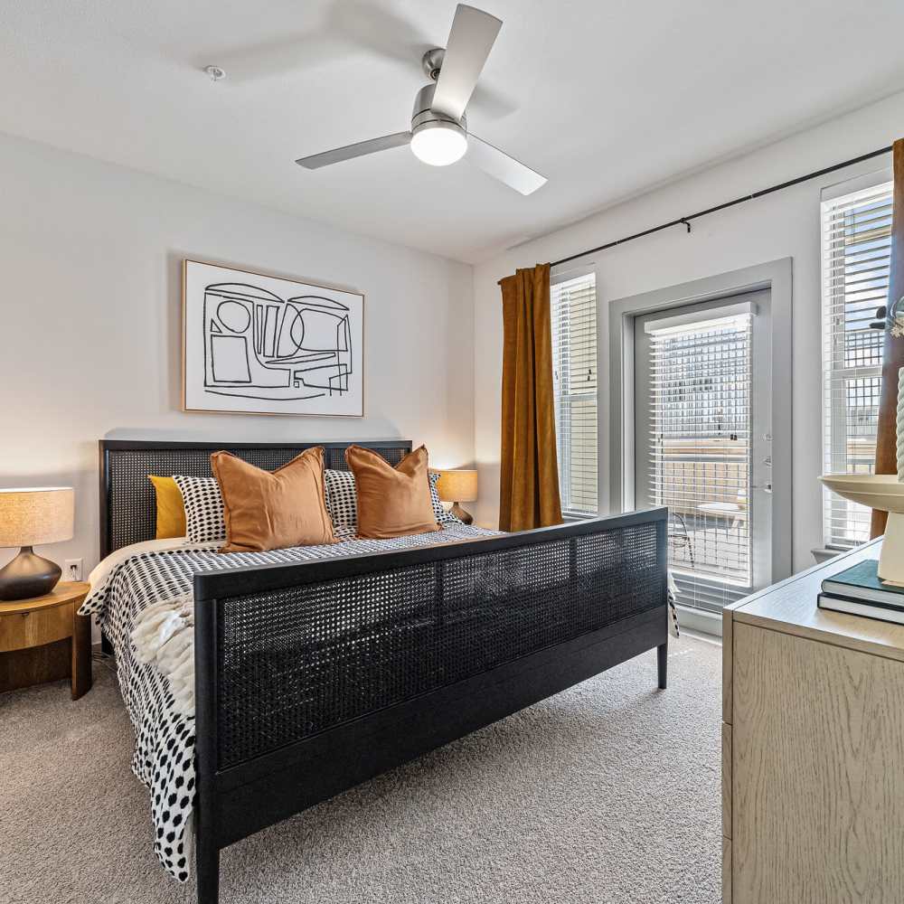 Spacious bedroom with a bed at Main and Mill in Lewisville,Texas