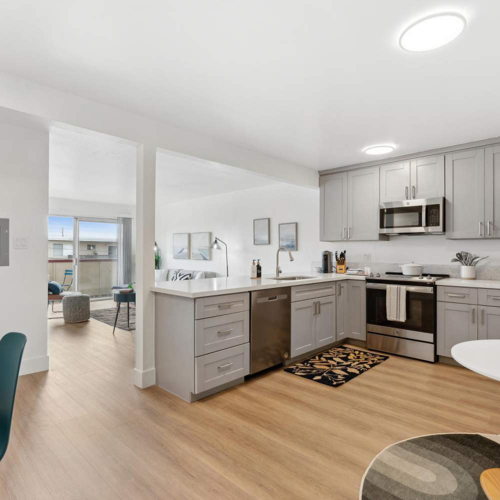 clean kitchen with brown floors at Del Coronado in Alameda, California