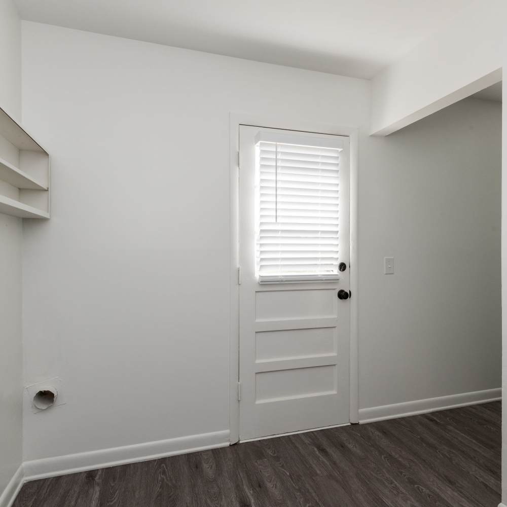 Apartment door with a window at New Village At Hermitage in Hermitage, Tennessee