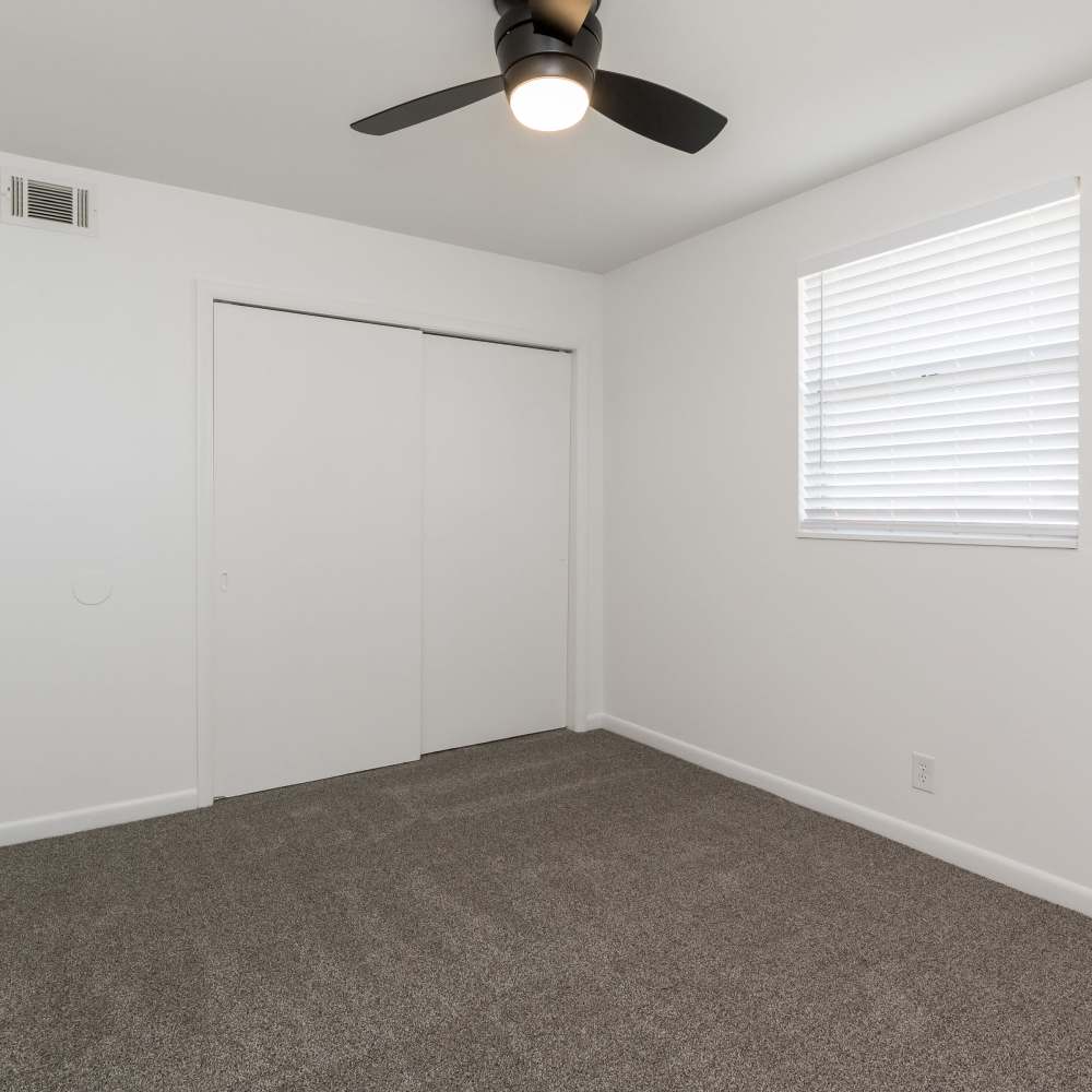 Bedroom with a window and closet at New Village At Hermitage in Hermitage, Tennessee