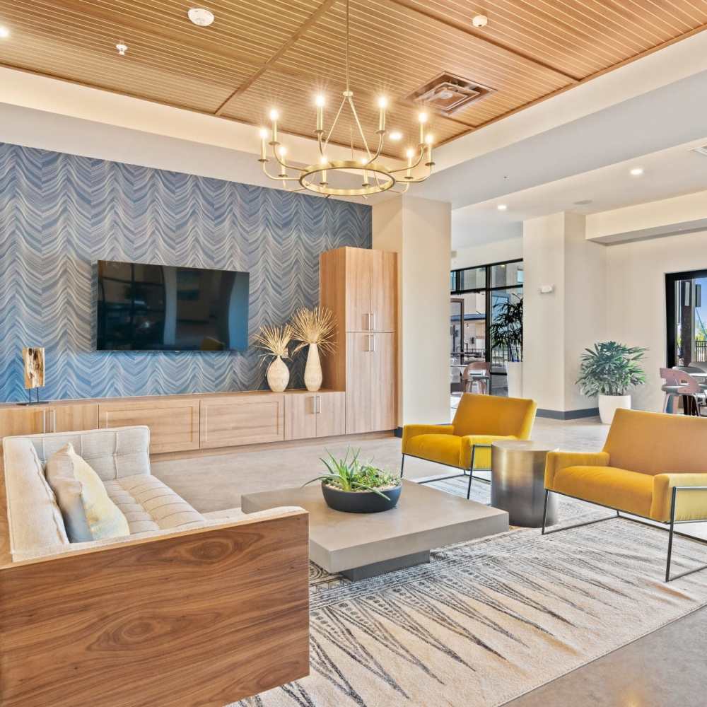 Spacious clubhouse with tall ceilings in a Drucker + Falk property