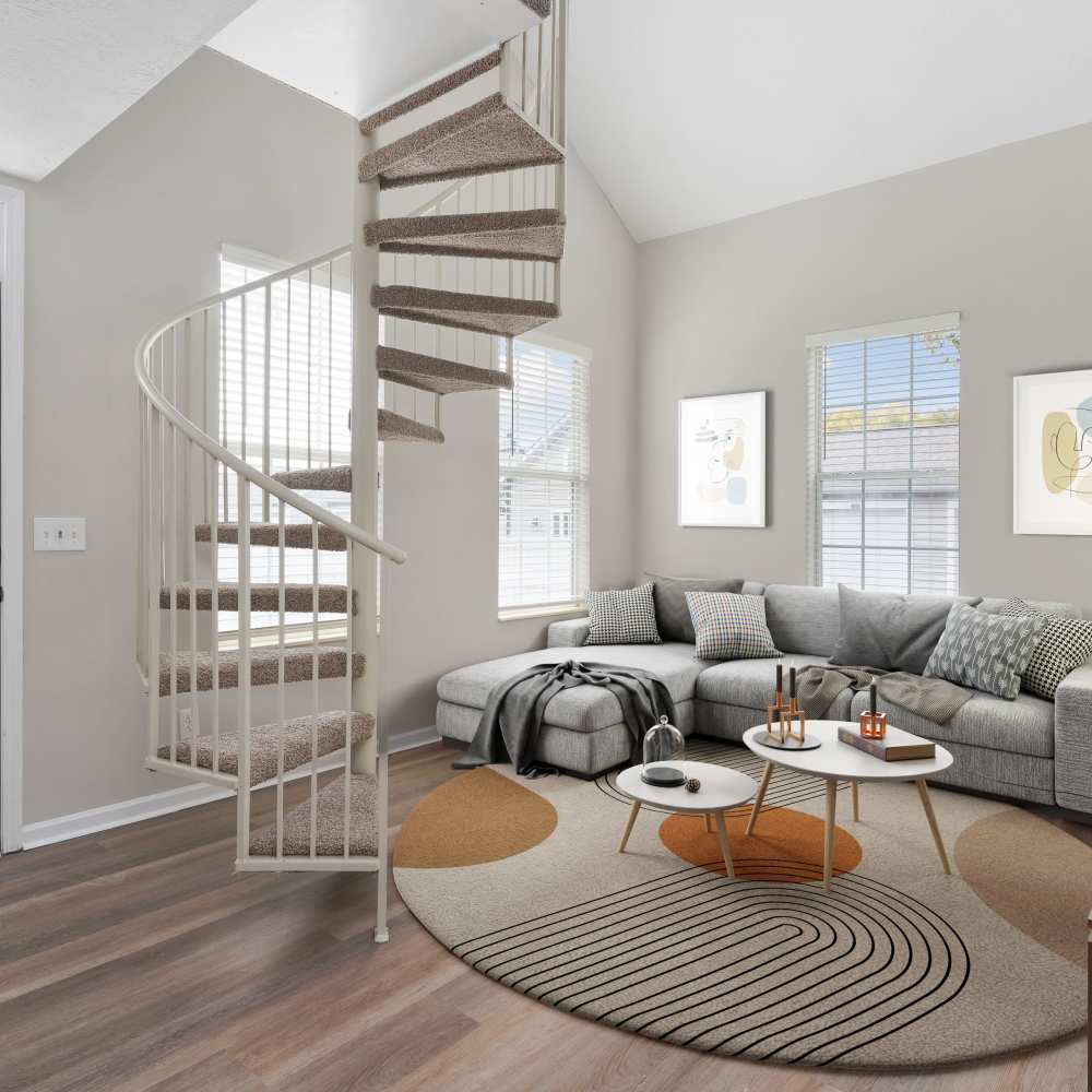 Spiral staircase in a Drucker + Falk property home
